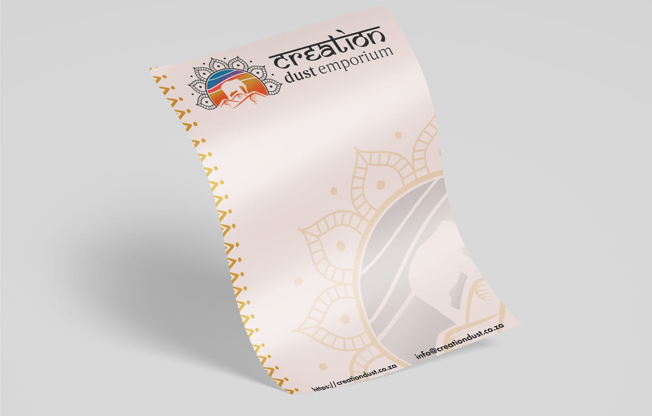 A curved, floating letterhead mockup for Creation Dust Emporium featuring the full color logo and a geometric gold-toned border on the left margin.